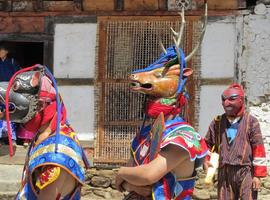 Masked dancers, Bumthang