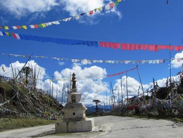Prayer flags lining the road, Bumthang