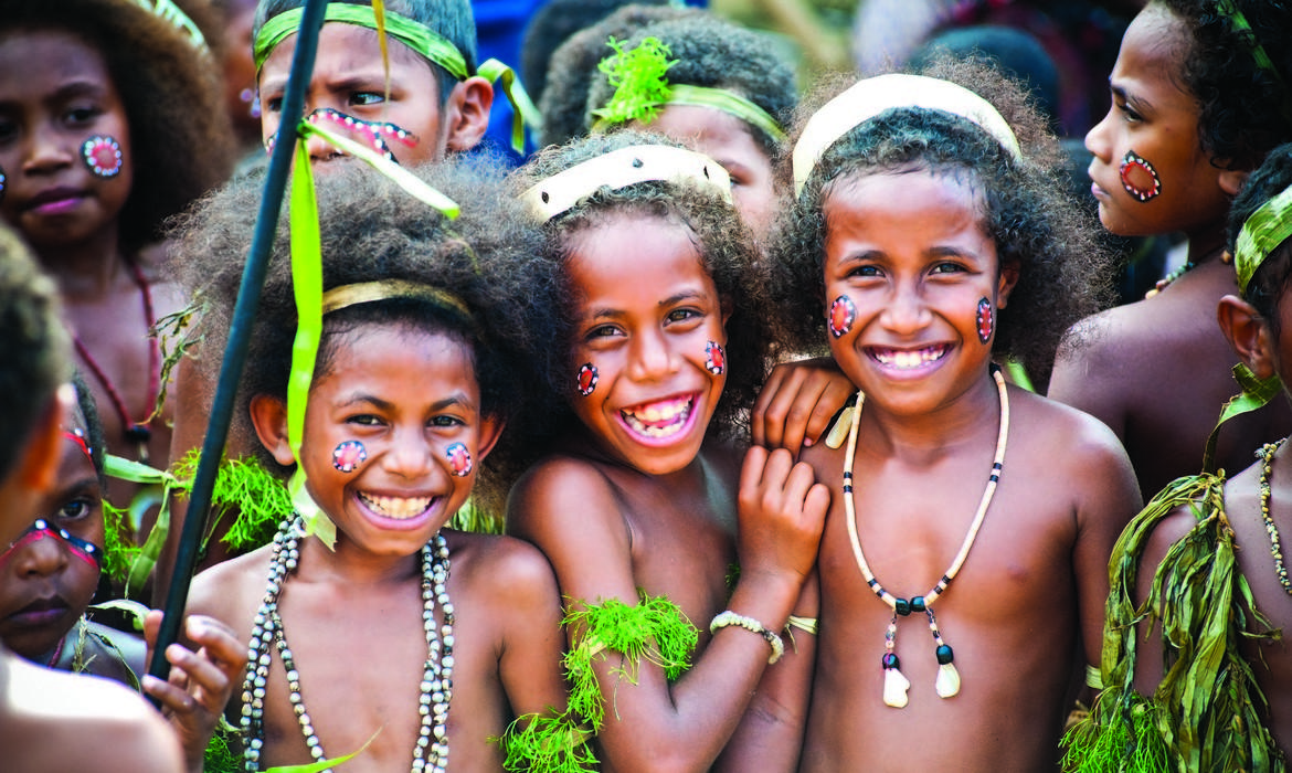 Laughing children at Milne Bay Canoe Festival, Milne Bay