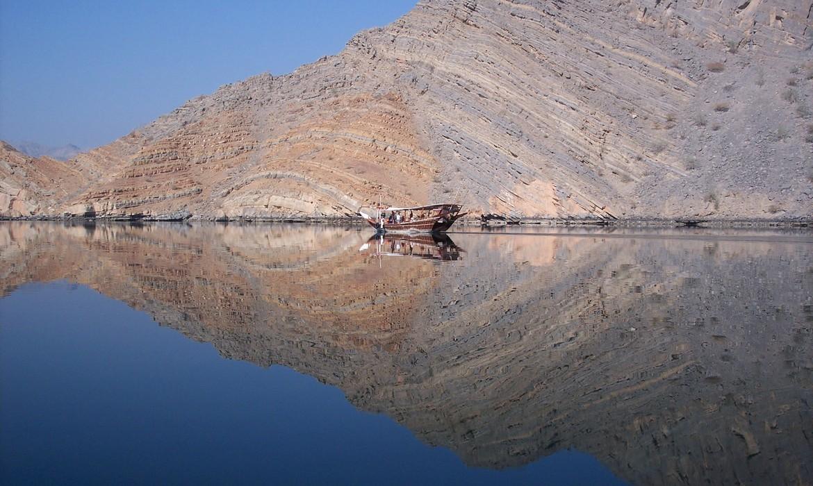 A dhow cruising in the Musandam fjords