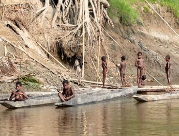 Local boys and canoes, Karawari River
