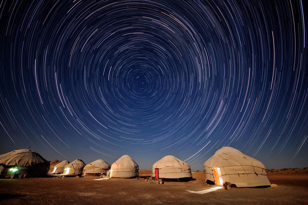 Yurts in the desert at night